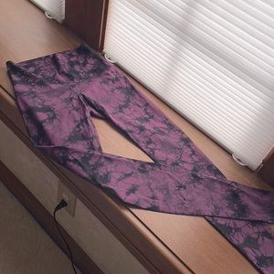 Lululemon leggings - size 6 - deep purple/black print. Inside pocket.